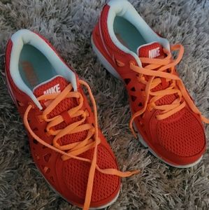 Red/Orange Nike Dual Fusion sneakers